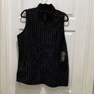 Woman Within Black and White Polka Dot Vest